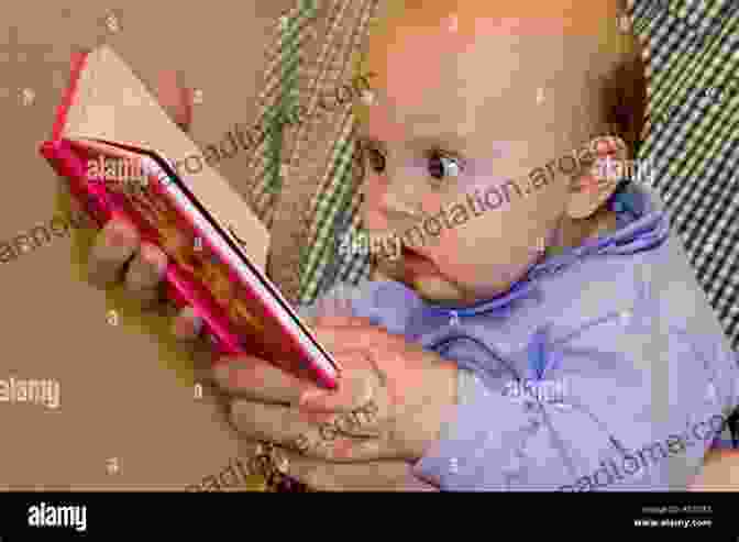 A Baby Sitting In A Cozy Chair, Engrossed In A Book With A Big Smile On Their Face. Baby S First Book: Shapes: High Contrast Black And White Baby (High Contrast Black And White Baby 1)