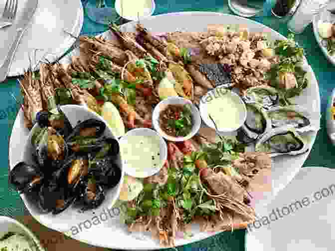 A Mouthwatering Platter Of Freshly Caught Seafood, Including Oysters, Mussels, And Fish, Ready To Be Savored. French Countryside Cooking: Inspirational Dishes From The Forests Fields And Shores Of France