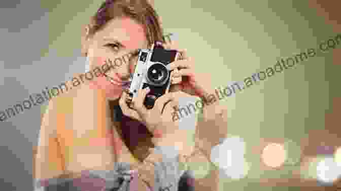 A Woman Holding A Camera, Her Face Illuminated By The Light Of Creativity 29 Fabulous Hi Def Fotos Of Females Vol 14 Expression/Mood