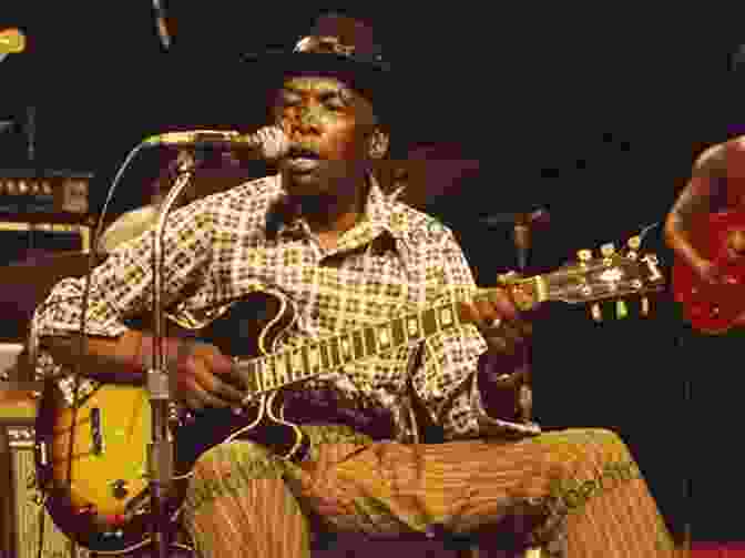 John Lee Hooker Playing Guitar Elwood S Blues: Interviews With The Blues Legends Stars