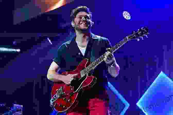 Niall Horan Performing On Stage Niall Horan: The Ultimate Fan Book: 100+ Niall Horan Facts Photos Quotes + More (Celebrity For Kids)