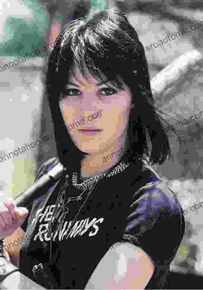 Portrait Of Joan Jett, A Young Woman With Long Dark Hair And Intense Eyes, Looking Directly At The Camera. Bad Reputation: The Unauthorized Biography Of Joan Jett